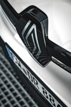Close-up of the Renault logo on the hood of a car, Deer E- Carsharing, Renault Megane, Calw,