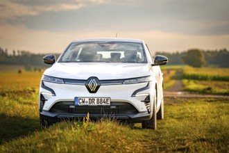 A white car on a dirt road at sunset with a wide view, Deer E-Carsharing, Renault Megane, Calw,