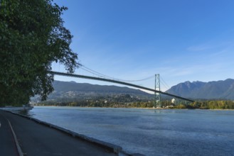 Lions gate bridge spanning burrard inlet, connecting vancouver with stanley park, viewed from the