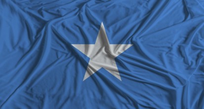 Somalia flag with fabric texture background. National flag of Somalia with cloth texture