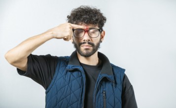 Man with nasal bridge pain on white background. Person with nasal bridge ache isolated