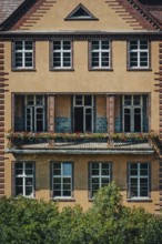 Façade with balcony and flower boxes, Lost Place, Heilstätten Beelitz, Brandenburg