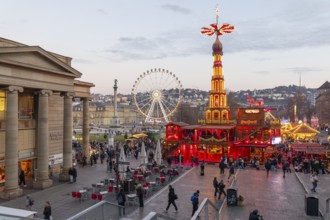 Stuttgart 2025 Christmas market on Schlossplatz with festive lights, a Christmas pyramid, mulled
