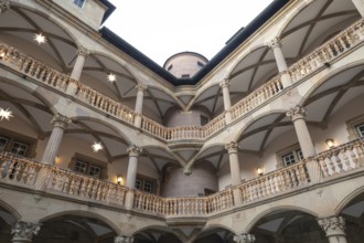 At Christmas time, the Old Palace in Stuttgart shines with festive poinsettias in the courtyard.