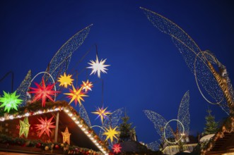 Colorful Christmas stars, golden angels, angel figure, angel motif, baroque Christmas market, blue