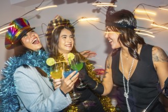 Diverse young adults at a lively new years eve costume party, dressed in festive outfits and