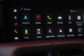 Digital display of a Porsche with apps for navigation, media and settings, Porsche Taycan, Deer