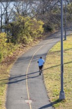 Washington, DC - A man jogs along the Annacostia Riverwalk Trail