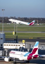 Eurowings aircraft, at terminal A and at takeoff, Düsseldorf airport, DUS