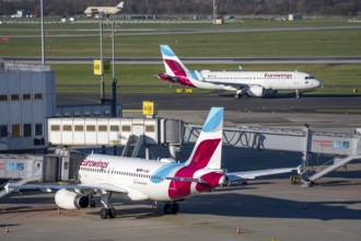 Eurowings aircraft, at terminal A and on their way to takeoff, Düsseldorf airport, DUS