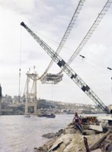 Construction of the Tamar Bridge in progress completed in 1961, view to Saltash, Cornwall from