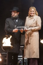 Julia Klöckner (President of the German Bundestag) receives a gift from Yehuda Teichtal (Rabbi of