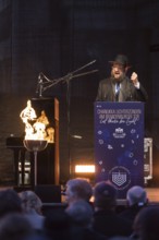 Yehuda Teichtal (Rabbi of the Chabad-Lubavitch movement) speaks at the lighting of lights to mark