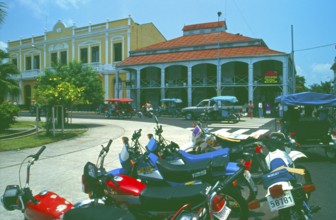 Motorbikes, iron house built by Gustav Eiffel in the center of Iquitos on the Amazon, Peru, South