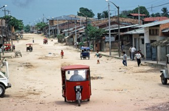 Street, houses, people, tuk-tuks, Iquitos, Peru, South America, September 1997, vintage, retro,