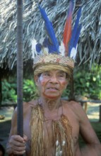 Chief of a Yagua tribe near Iquitos on the Amazon poses for photos, Peru, South America, September