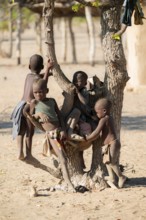 Children play in the village, the Hakaona tribe, also Havakona or Hakawona, near Opuwo, Kunene,