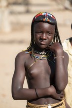 Portrait, brightly decorated girl of the Hakaona tribe, also Havakona or Hakawona, near Opuwo,