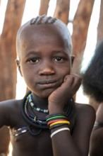Portrait, curious Himba child, traditional Himba village, Kaokoveld, Kunene, Namibia