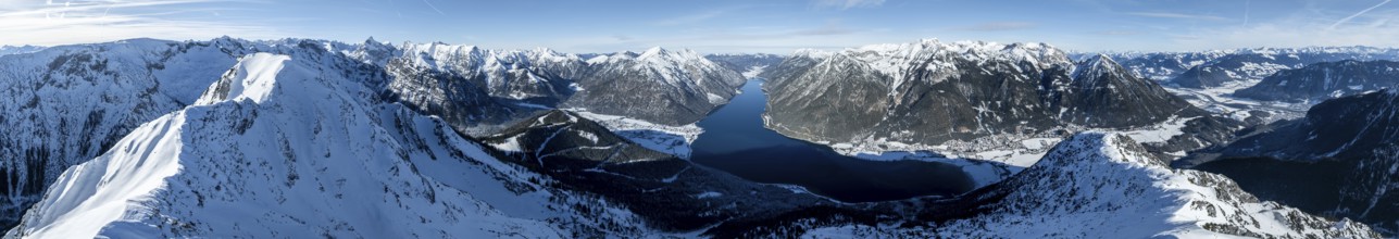 Aerial view, epic view of mountain landscape with snow in winter, summit of Bärenkopf, Achensee,