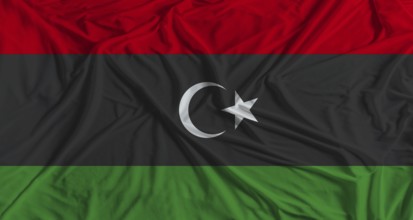 Libya flag with fabric texture background. National flag of Libya with cloth texture