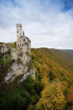 Castle and autumnal forest, Lichtenstein Castle, Honau, Echaz Valley, Swabian Jura,