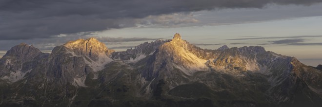 Sunrise on the Mindelheim via ferrata, a mountain range with the three sheep alpine heads up to the