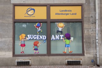Colourful illustrations of children playing, Youth Welfare Office, Altenburg, Thuringia