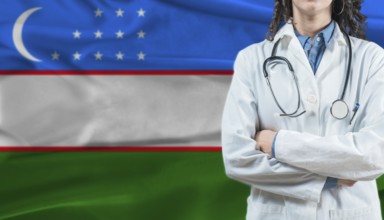 Medical professional on Uzbekistan flag. Healthcare and wellness in Uzbekistan, Concept