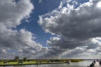 Rain clouds (Nimbostratus) over the harbour of Ahrenshoop, Darß, Mecklenburg-Vorpommern, Germany