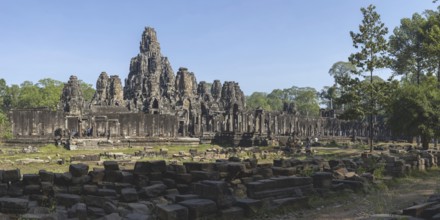 Panoramic picture of the south side of Bayon Temple, with huge stone-carved faces of Bodhisattva