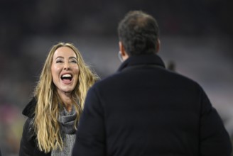 DAZN presenter reporter Sylvia Walker talking with TV expert Michael Ballack, laughs, Allianz