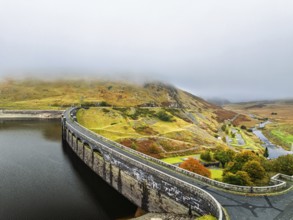 Autumn over Claerwen Dam, Claerwen Valley, Elan Valley Reservoir, Rhayader, Powys, Wales, UK