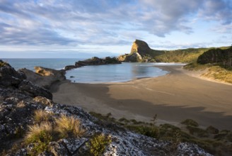 Deliverance Cove and Castle Rock, rocks, ocean, surf, morning. Castlepoint, Wairarapa Coast,