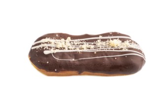 Glazed Chocolate Eclair on brown concrete isolated on white, side view, close up