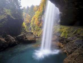 Waterfall mountain list in autumn-colored surroundings, Linthal, Klausenpass, Canton of Glarus,