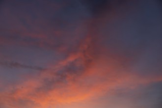 Red clouds in the evening sky, Bavaria, Germany