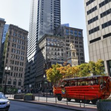 Boston Duck Tour, special city tour in amphibious vehicle from World War II, red bus in front of