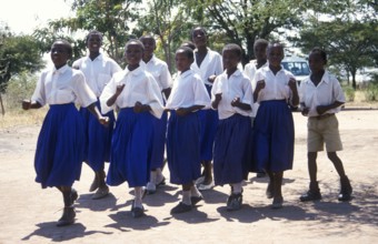 Children from a World Vision project dance on the occasion of a godfather's visit, Nyabubinza,