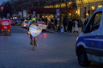 Grandma for Future is cycling back after the Fridays for Future rally. On the left, bicycle