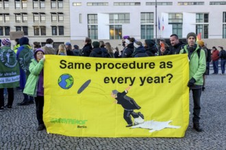 Greenpeace activists at Fridays for Future rally on 10 years of Paris Agreement and 7 years of