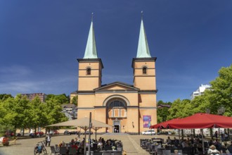 Dining on Laurentiusplatz and the Basilica of St. Lawrence in Elberfeld, Wuppertal, North