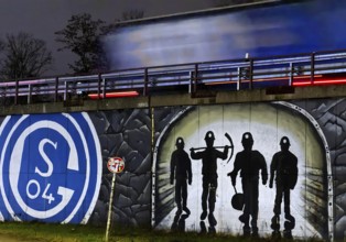 FC Schalke 04 logo and mining motif at the A 42 Gelsenkirchen-Schalke motorway exit at night, North