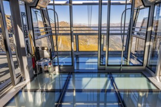 Cable car gondola with viewing terrace and glass floor, Espace Weisshorn mountain station, Val
