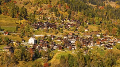 The mountain village of St-Jean in autumn colors, Val d'Anniviers, Valais Alps, Canton of Valais,