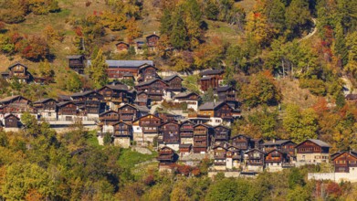 The mountain village of Pinsec with autumn colors, Val d'Anniviers, Valais Alps, Canton of Valais,