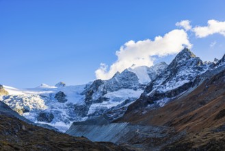 Clouds over the peaks of the Grand Cornier, Tete Blanche and Pointe Moiry mountains, Val