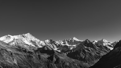 Snowy peaks of the Weisshorn, Schalihorn, Zinalrothorn, Besso and Obergabelhorn mountains, black
