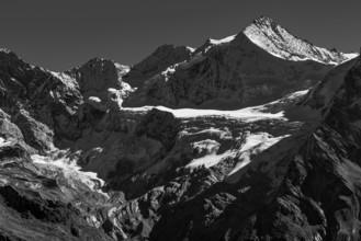 The snow-capped peak of Mount Zinalrothorn, black and white, Val d'Anniviers, Valais Alps, Canton