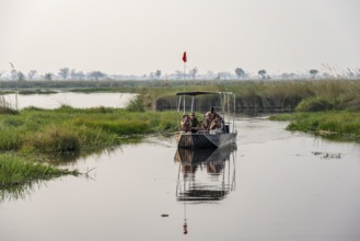 Safari by boat, tourists, Xakanaxa Lagoon, Okavango Delta, Moremi Game Reserve, Botswana